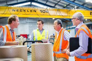 Shinka consultants observing a factory